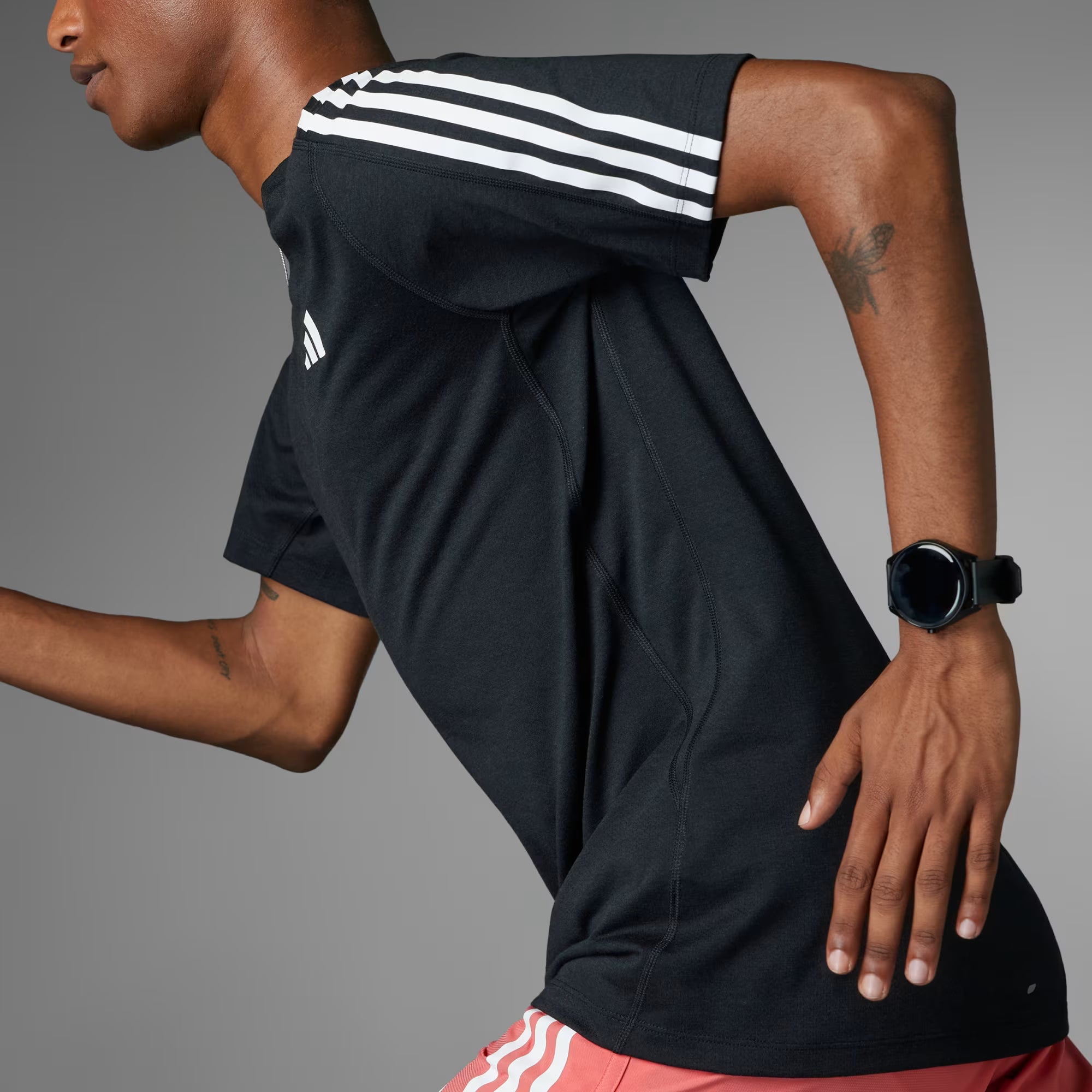 CAMISETA OWN THE RUN 3 RAYAS